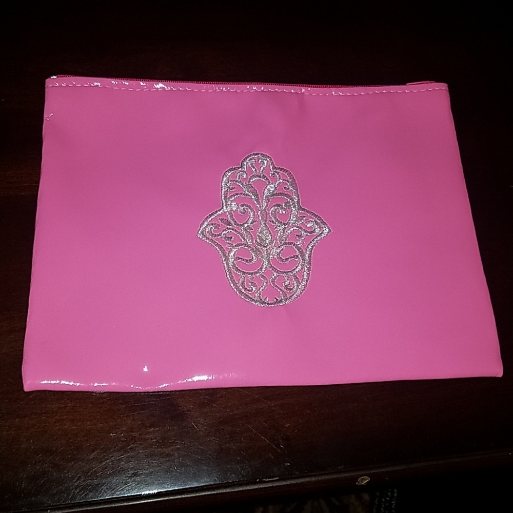 Brand new pink pouch with silver Hamsa